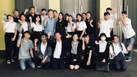 a group of people posing for a photo